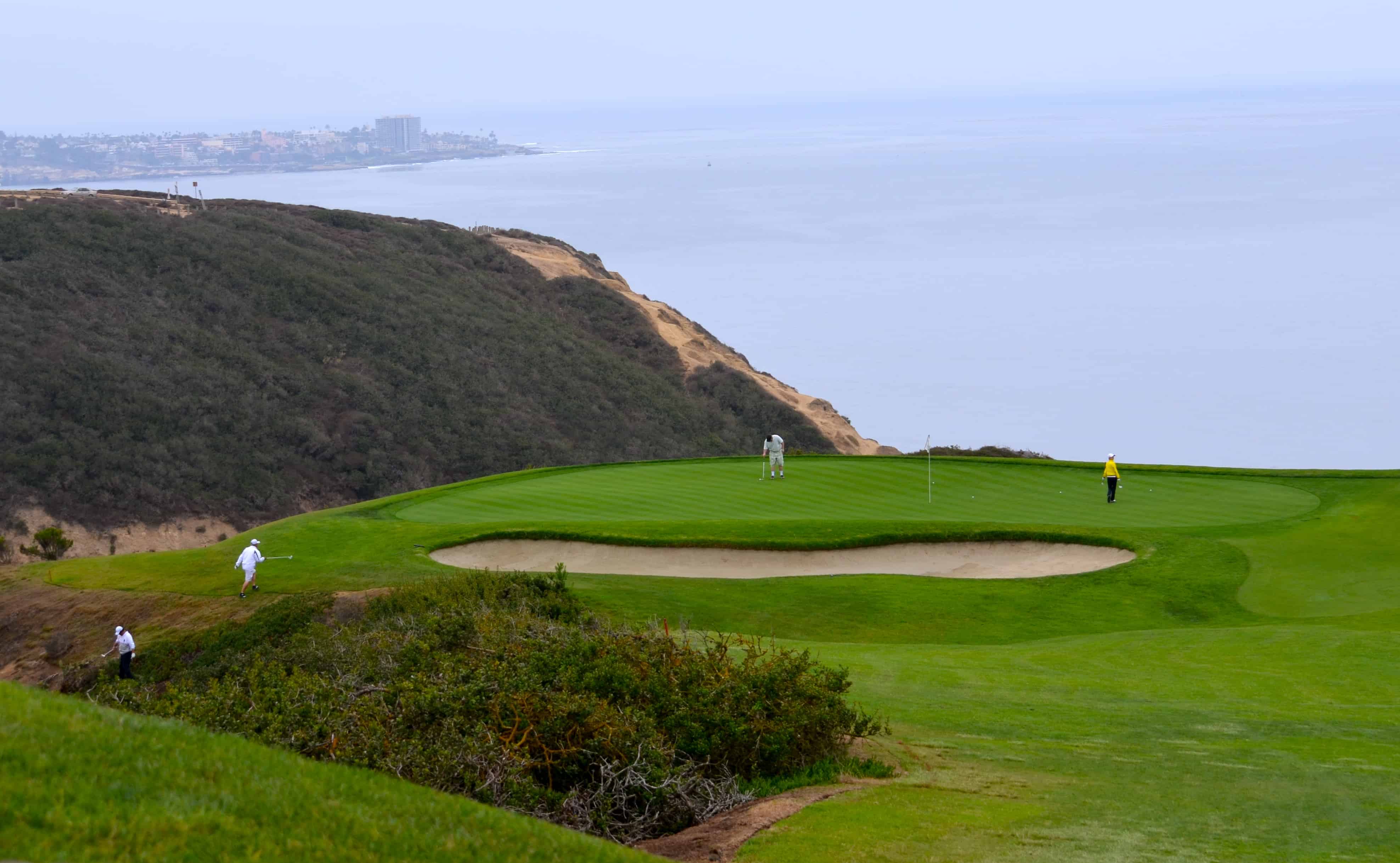 A par 3 at Torrey Pines South Course, the green sitting on a cliff above the Pacific