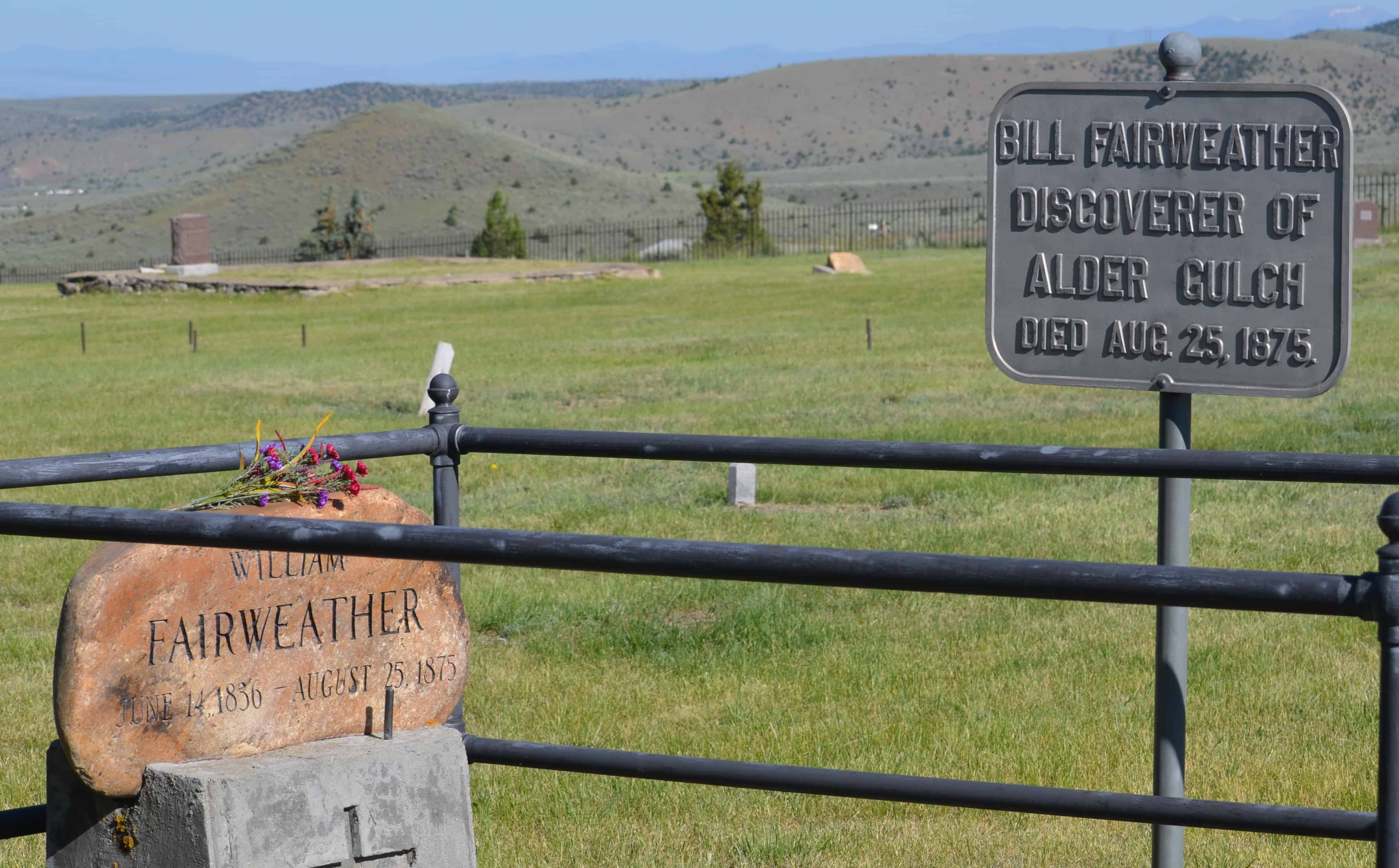 Bill Fairweather's grave on Boot Hill, Virginia City, Montana, with the sign noting his discovery of gold at Alder Gulch in 1863