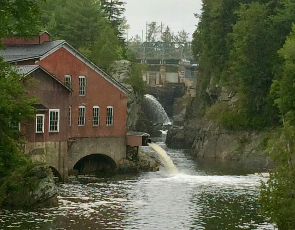 A waterfall and barn at St Martin, New Brunswick