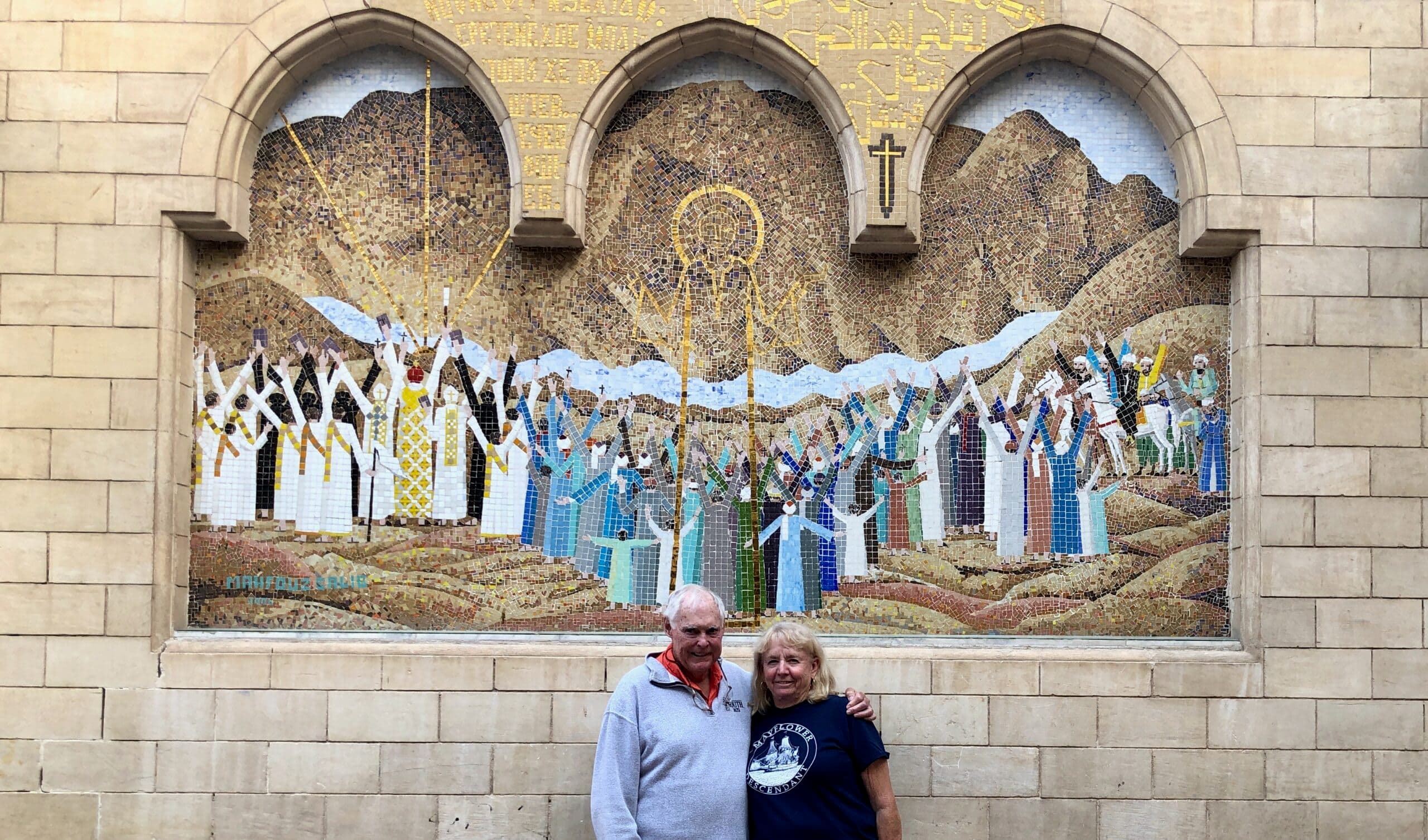John and Janice at a fresco in the courtyard of the Hanging Church